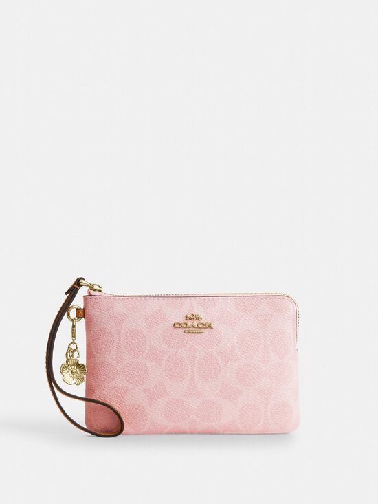 Coach Handbags - Coach Outlet Corner Zip Wristlet In Signature Canvas With Charms